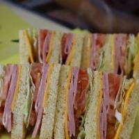 32-Ham Club Sandwich · Cheese, mayonnaise, mustard, lettuce, tomato, onion, and pickle.