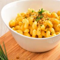 Millionaire Mac N' Cheese · You don't have to be a millionaire to indulge in this cheesy dish featuring maple-glazed thi...