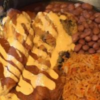 Chili Relleno · Poblano/queso/salsa rojo/ rice & beans