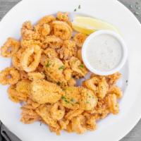 Fried Calamari · With fried green beans and artichokes served with lemon caper aioli and homemade cocktail sa...