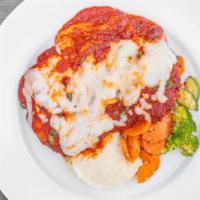 Chicken Parmesan · Served with mashed potatoes, sautéed spinach and light marinara.