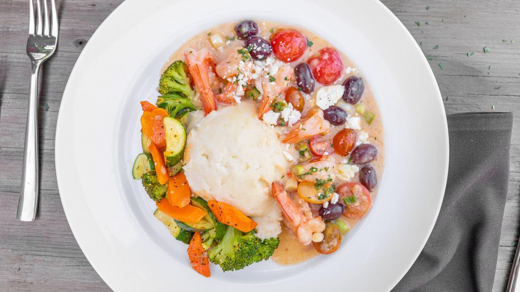 Mediterranean Prawns · With garlic mashed potatoes, mixed vegetables topped with onion rings.