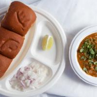 Pav Bhaji (3) · Three toasted bread served with potato, cauliflower, and peas curry.