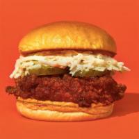 Nashville Hot · Our signature fried chicken made spicy and served on a toasted bun, topped with coleslaw, an...