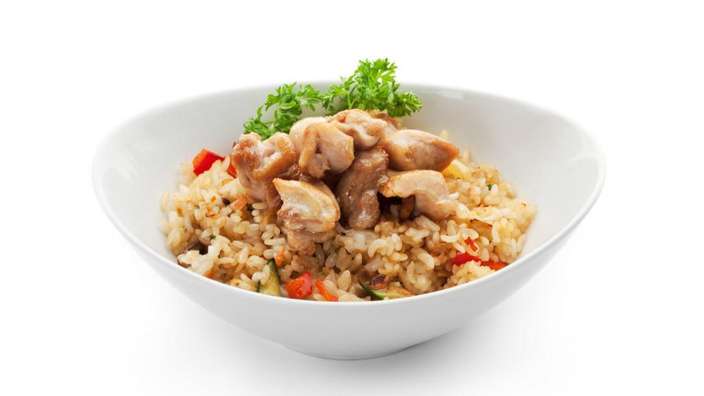 Chicken Fried Rice · Fried rice, scallions, soy sauce and egg with fresh veggies and chicken.