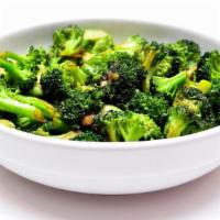 Broccoli with Fish Fillet · Sautéed crispy broccoli with fresh stir fried fish fillet.