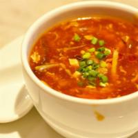 Hot & Sour Soup · Hot and tangy soup prepared with tofu, bamboo shoots, and fungus.