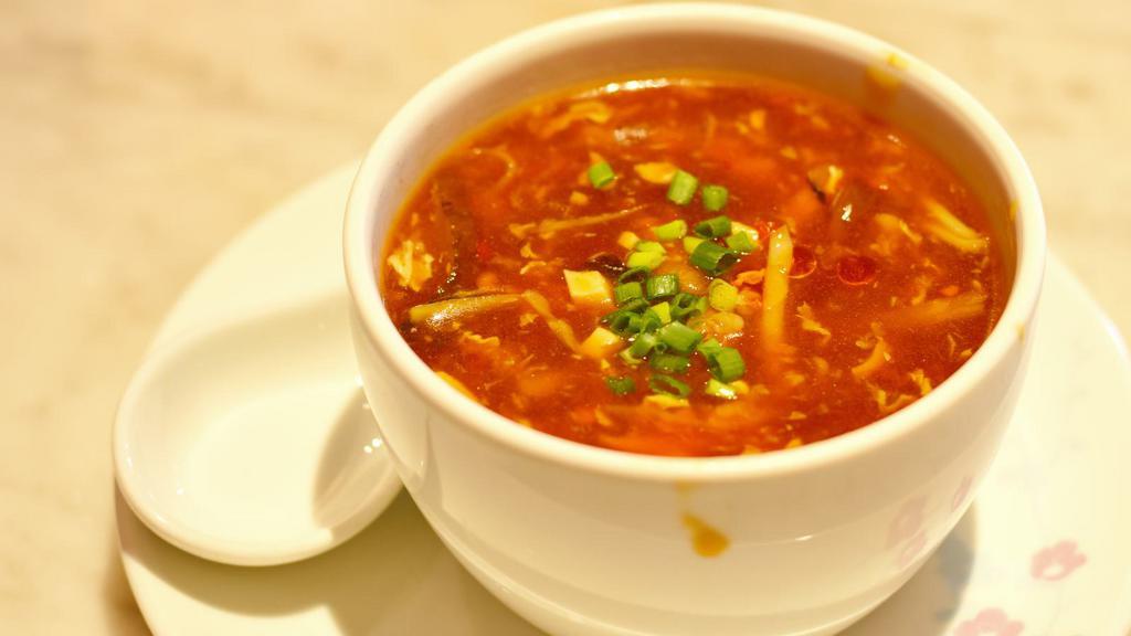 Hot & Sour Soup · Hot and tangy soup prepared with tofu, bamboo shoots, and fungus.