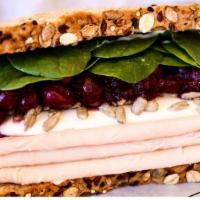 Beach Bikini · Only includes what is listed. Turkey, cream cheese, sunflower seeds, cranberry sauce, spinac...