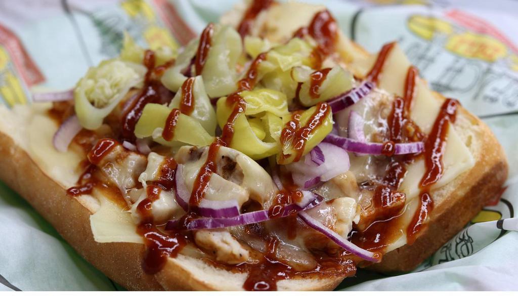 Beach Bbq · Chicken, BBQ sauce, tabasco, choice of cheese, onions & pepperoncinis. Toasted French roll.