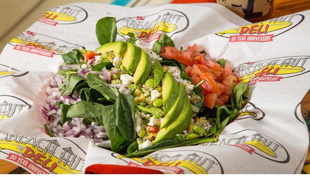 Super Salad · Quinoa, edamame, cilantro, corn & bell pepper mix. Avocado, onion, tomatoes & feta cheese. Lemon vinaigrette. Served with choice of spring mix, romaine or spinach.