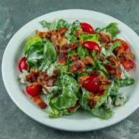 Butter Lettuce Salad · Smoked bacon, Point Reyes blue cheese crumbles, grape tomatoes and buttermilk ranch.