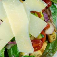 Mixed Greens Salad · Baby greens, parmesan, croutons, cucumber, carrots, grape tomatoes, red onion and your choic...