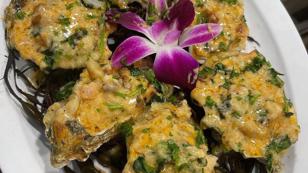 Chargrilled Oysters Dozen · Goose point oysters grilled to perfection topped with garlic butter, creole seasoning and parmesan cheese.