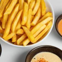 French Fries Portion · 14 oz. portion of fries to dip with 2 of our amazing sauces!
