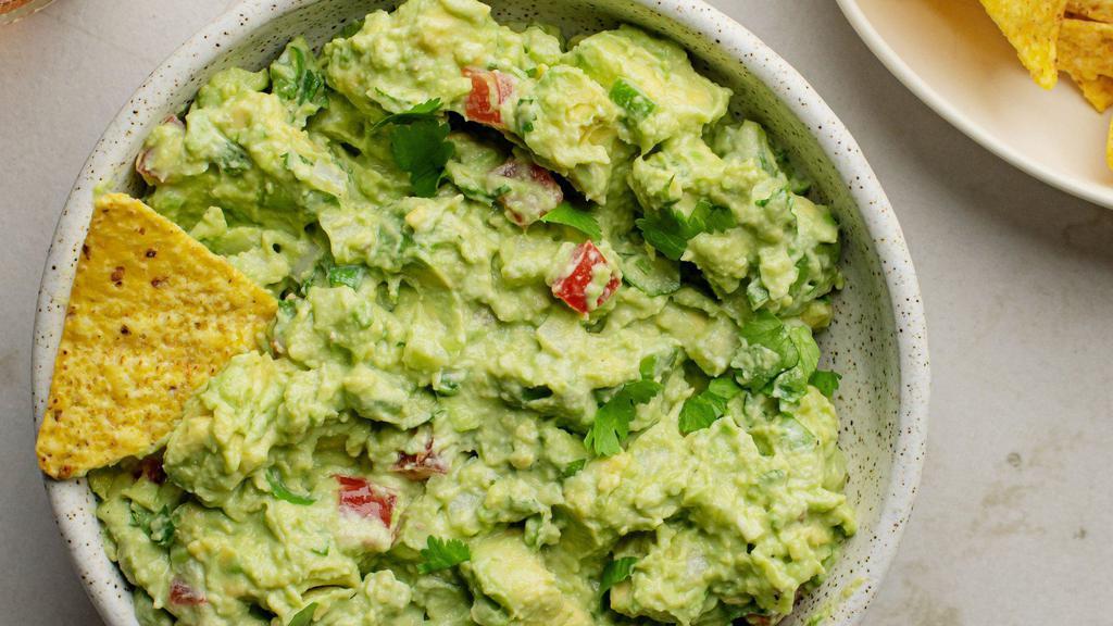 Guacamole · Creamy avocado with red onions, finely chopped cilantro, red chili pepper, and a squeeze of lime juice. 4 oz