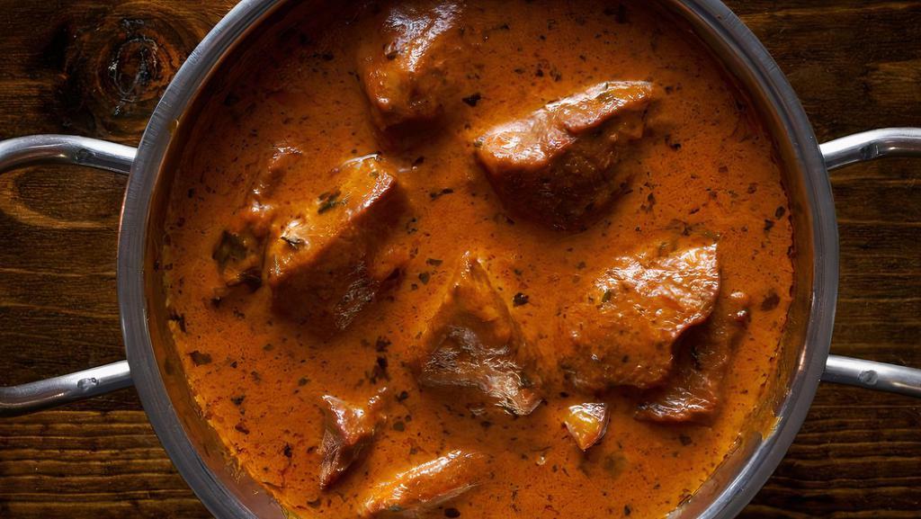 *Lamb Tikka Masala · Gluten-free, nut-free, no onion no garlic. Mild. lamb marinated and cooked in clay oven, then tossed in a rich gravy of tikka masala.