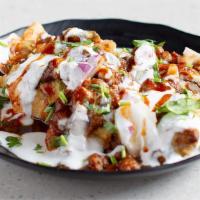 *Samosa Chaat · Chef recommended. It is spicy, tangy, sweet chaat made with mashed samosa, chick peas, tamar...