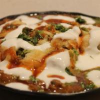 *Khasta Dal Kachori Chaat · Chaat of crispy fried lentil stuffed pastry with chickpeas, potato dices, topped with tamari...