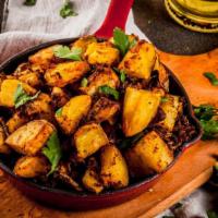 *Tawa Aloo Chaat · Vegan, gluten-free, nut-free, no onion no garlic. Medium. fried & crisp potato squares, masa...