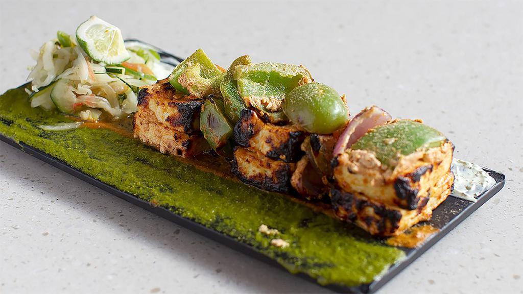 *Tandoori Paneer Tikka · Gluten-free, nut-free. Hot. dices of fresh cottage cheese, marinated in fresh cream, spices and grilled in a clay oven called tandoor.