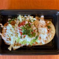 Huarache · Corn masa cake with choice of topping, re-fried beans, cabbage, sour cream, queso fresco, av...