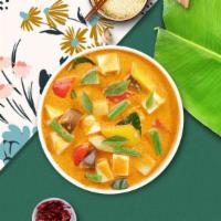 High On Yellow Curry (Tofu) · Yellow curry tofu simmered with tomatoes, potatoes, coconut milk and sweet onion.