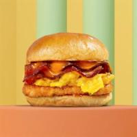 House Breakfast Sandwich · Eggs with crispy bacon, hash brown, melted cheese, and house sauce.