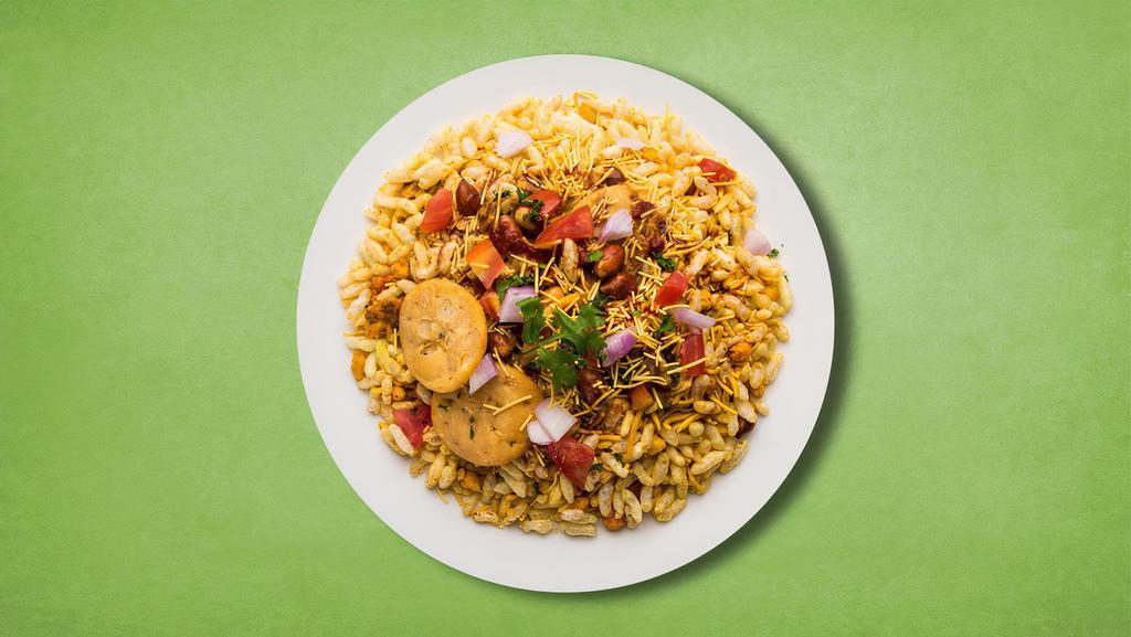Masala Puffed Rice · Popular savoury street snack recipe made with puffed rice, finely chopped veggies and chaat relish.