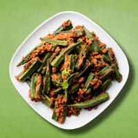 Spicy Masala Okra  · Diced fresh okra, sautÃ©ed with onions, garlic and spices till crisp then cooked in tomato a...