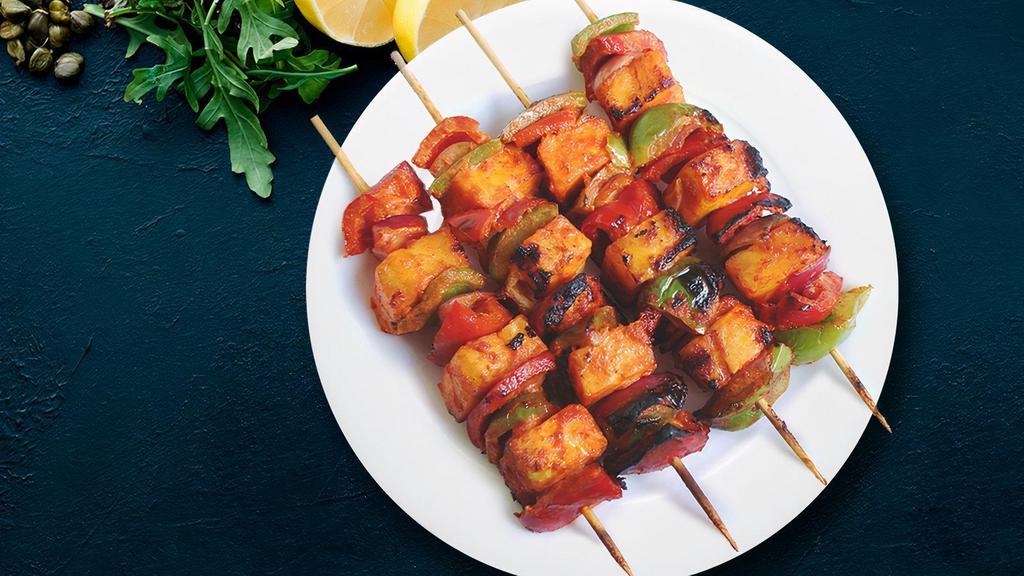 Grilled Paneer Tikka Kebob · Perfect oven roasted paneer cubes, onion and bell pepper marinated with spices and yogurt
