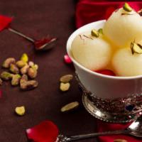 Rasgulla · Soft succulent ball-shaped Dumplings made with Cottage Cheese, Semolina Dough cooked in ligh...