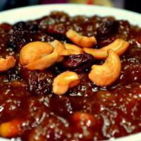 Qubani Ka Meetha · Traditional Hyderabadi Dessert made with Dried Apricots and Garnished with Nuts and served c...