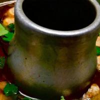 TOM YUM  · mild spicy & sour broth, lime juice, tomatoes, cilantro, mushroom.  ( choice of meat: chicke...