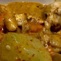 MANSAMAN CURRY · Mansaman coconut milk curry, potatoes, carrots, and onion. With your choice of meat