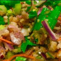 NAM KHAO · Crispy rice,  fermented sausage, cilantro, ground peanuts, green onion & mint