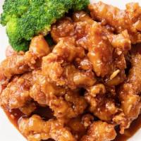 Orange Chicken · Fried and garnished with broccoli.