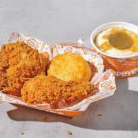 2 Piece Combo · Choose mild or spicy chicken. Two pieces chicken, regular side, biscuit, small drink.