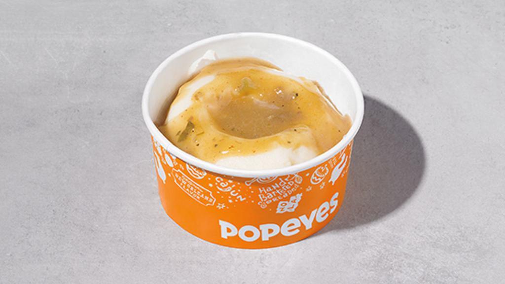 Mashed Potatoes With Cajun Gravy · Smooth, creamy mashed potatoes covered with Popeyes' flavourful cajun gravy.