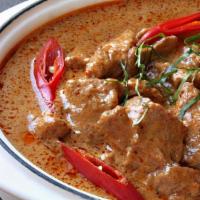 Panang Curry · Choice of chicken or beef cooked in red coconut curry sauce. With shrimp for an additional c...