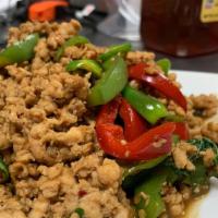Spicy Basil · A choice of ground chicken or ground pork with a mixture of chili, bell pepper and basil. Wi...