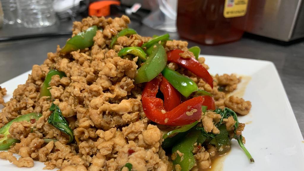 Spicy Basil · A choice of ground chicken or ground pork with a mixture of chili, bell pepper and basil. With ground beef or with shrimp for an additional charge.