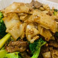 2. Pad See-ew · Flat rice noodles pan fried with egg, broccoli and your choice of chicken or beef or pork. W...