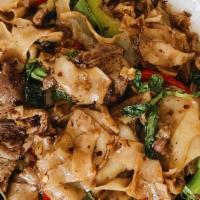 6. Kee Mow Noodles (Spicy) · Flat rice noodles pan fried with chili thai spices, broccoli, bell pepper and basil leaves, ...