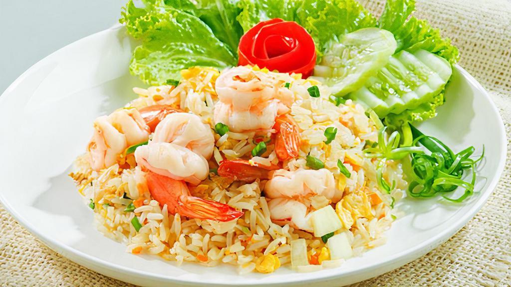 1. Thai Fried Rice · Pan fried steamed jasmine rice with egg, tomatoes topped with green onion and your choice of chicken or beef or pork. With shrimp, with crab or with combo for an additional charge.