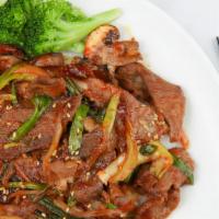 SPICY PORK BOWL · Served with Rice.
 Spicy hot BBQ pork, sautéed with vegetables