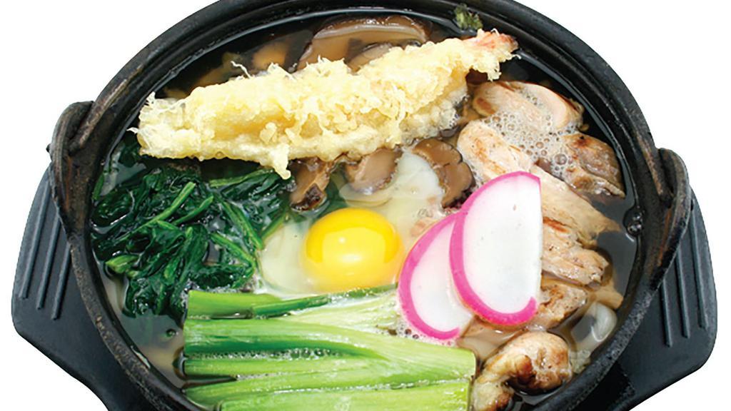 Nabeyaki Udon · Udon in hot pot with egg, chicken, tempura and vegetable.