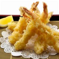 Shrimp Tempura Meal · Battered shrimps and deep fried.
