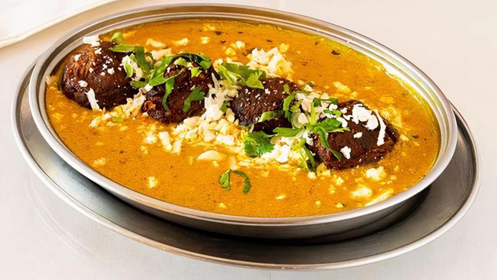 Malai Kofta · Mixed vegetables and cottage cheese balls cooked in butter sauce.