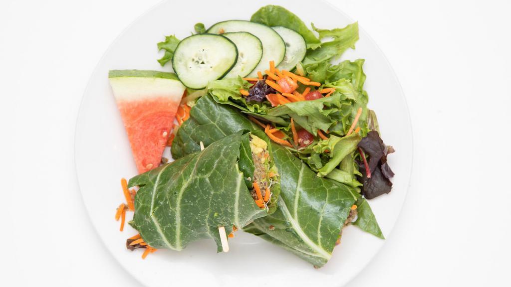 Collard Wrap · Raw-Vegan. Sunflower seed pate, tomatoes, carrots, cucumbers, onions, avocado, alfalfa sprouts, and house dressing.